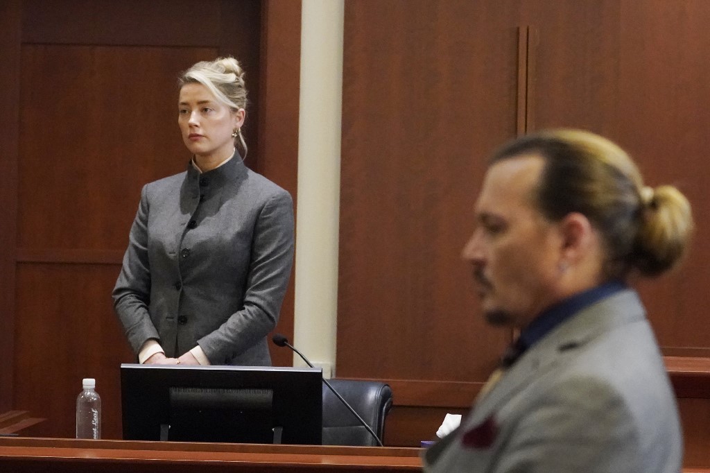 Após perder processo judicial, Amber Heard afirma que fez acordo com Johnny Depp